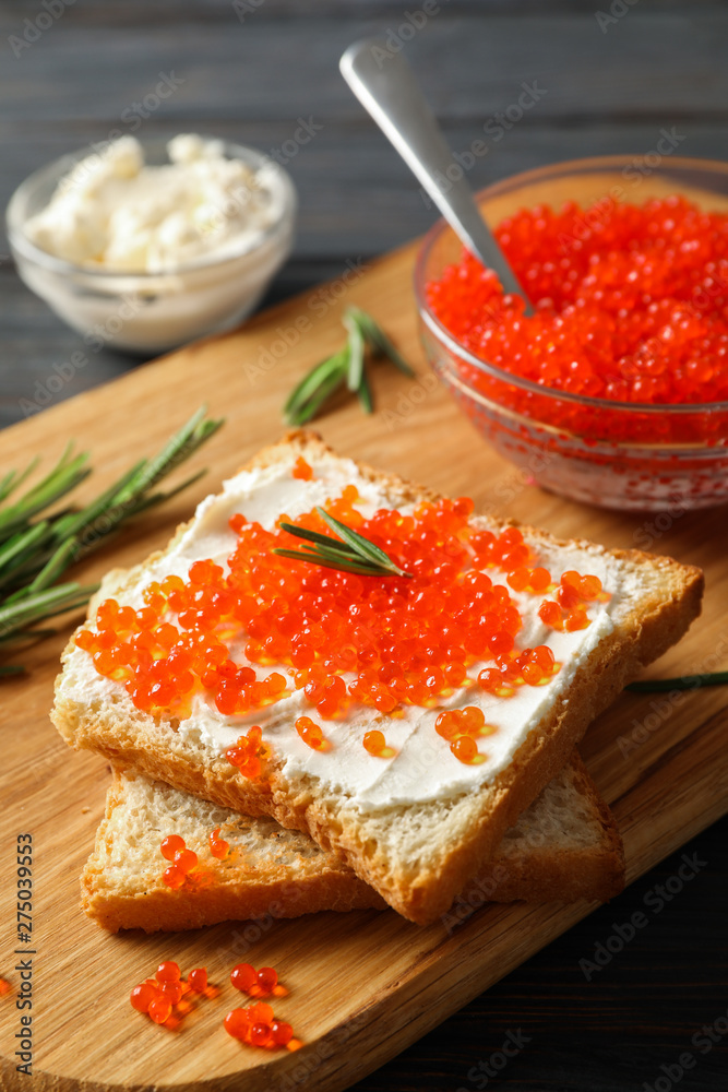 Appetizing composition with caviar on wooden background, space for text Appetizing composition with caviar on wooden background, space for text