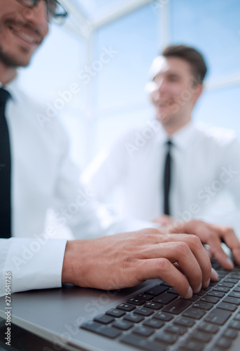 Businessman working with financial data on laptop computer