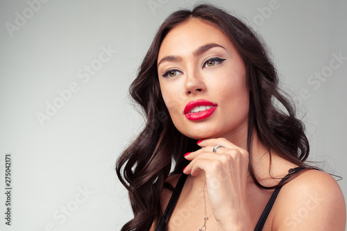 beautiful long hair young woman portrait with makeup, studio