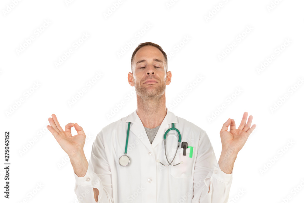 Young doctor practicing relaxation techniques to reduce stress Young doctor practicing relaxation techniques to reduce stress