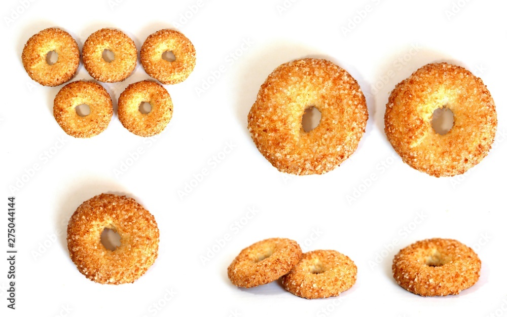 A variety of shaped cookies. White cup of tea. Morning is sweet. Tea ceremony. A variety of shaped cookies. White cup of tea. Morning is sweet. Tea ceremony.