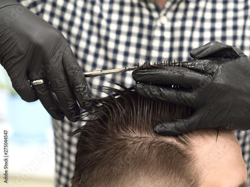 The technique of cutting with scissors men's hair styles