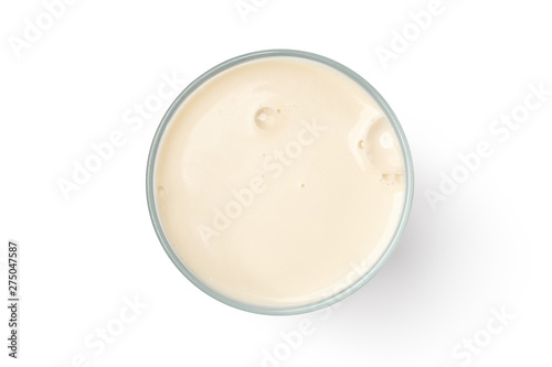 Cup with soy milk bubble foam isolated on white background, top view