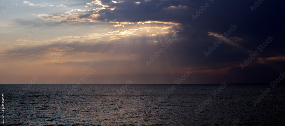 Landscape of clouds and sea in the rays of the sun. View from Sinemorets resort, Southern Black Sea Coast, Bulgaria.