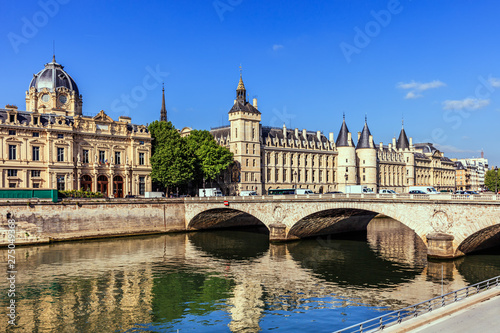 Conciergerie Castle and Bridge of Change over river Seine. Paris, France