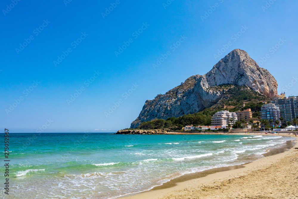 Sand beach and Natural Park of Penyal d'Ifac on background, Calpe, Spain