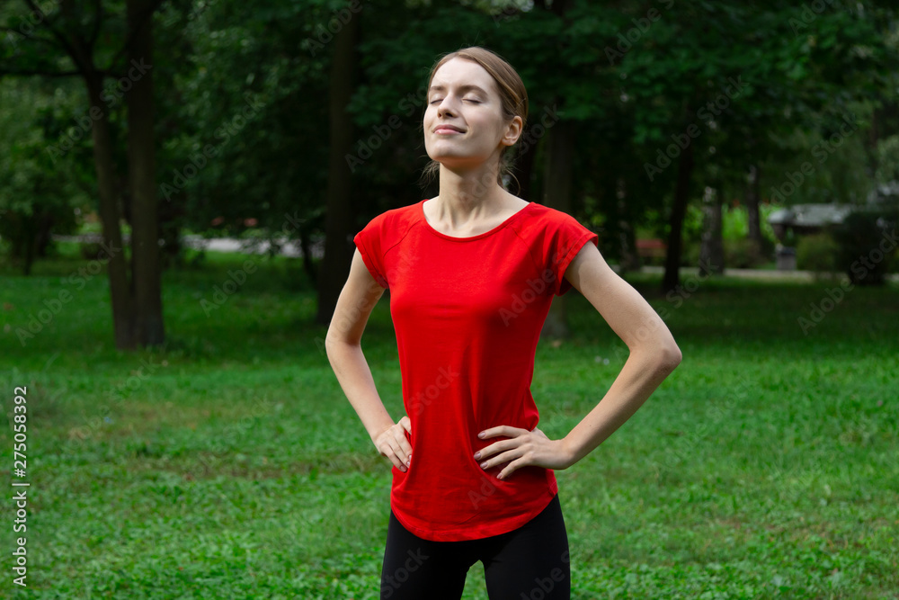 Girl doing yoga in morning park Girl doing yoga in morning park
