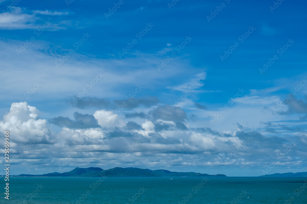 The white clouds in the sky background