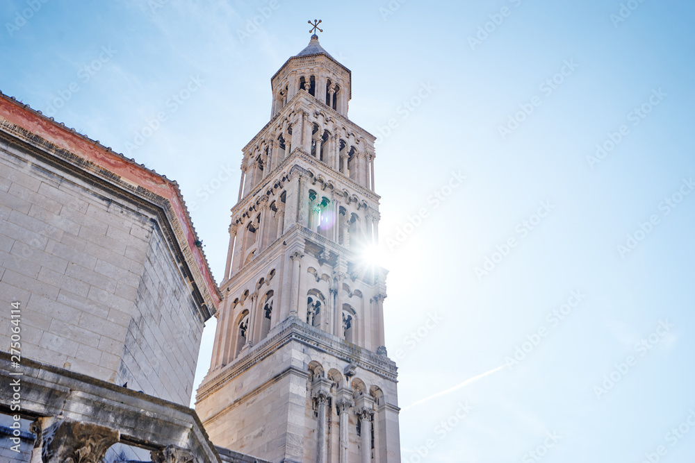Travel by Europe. Ancient Diocletian Palace, Tower and cathedral against blue sky in Split Old Town, Croatia.