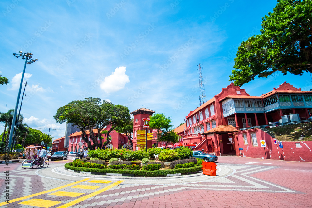 2019 May 8th, Malaysia, Melaka - View of buildings and people at the Dutch square on a beautiful day. 2019 May 8th, Malaysia, Melaka - View of buildings and people at the Dutch square on a beautiful day.