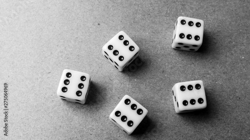 Dice black and white - the concept of play and unpredictability