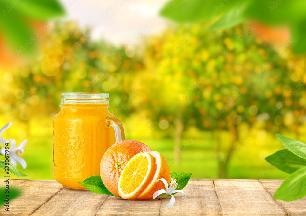 Orange Juice In A Glass Jar On The Kitchen Table Stock Photo, Picture and  Royalty Free Image. Image 12610775.