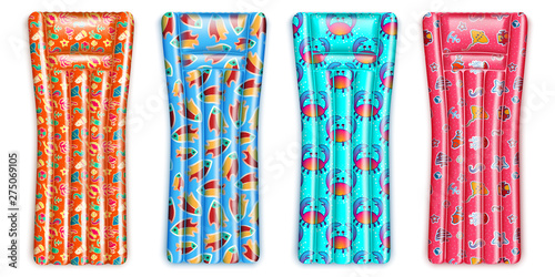 Set of inflatable rubber mattress of different colors with a pattern of marine life. For a beach holiday, sunbathing, sunbathing on the water. In the style of realistic. Isolated on white background