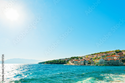 Panoramic view on one of many harbors of a small town Postira - Croatia, island Brac