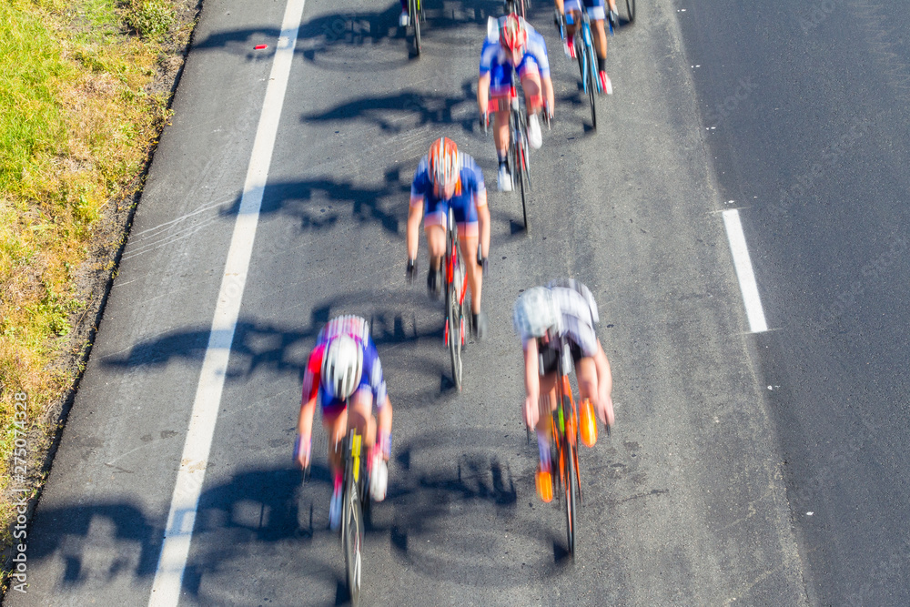 Fototapeta premium Cyclist Road Race Motion Speed Blur Overhead