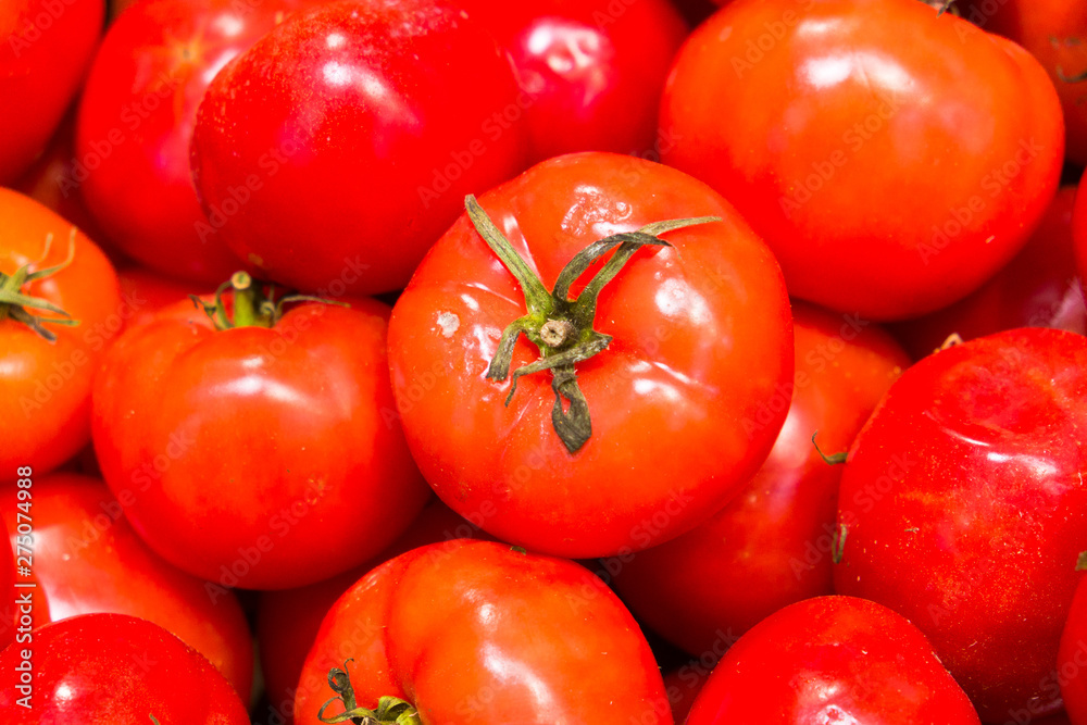 fresh tomatoes on the supermarket counter fresh tomatoes on the supermarket counter