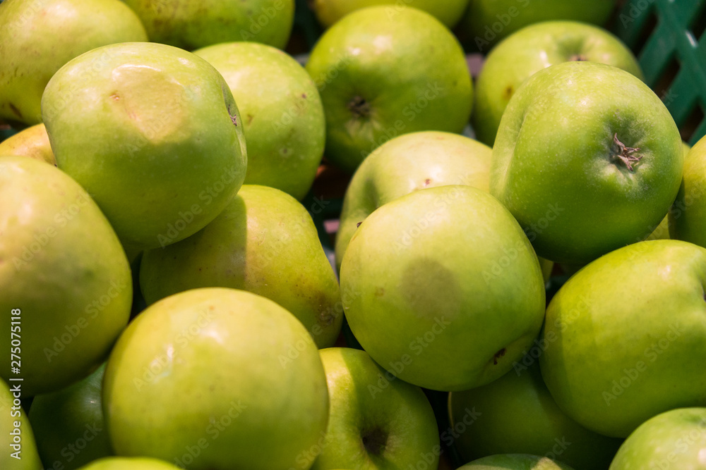 green apples on a black background green apples on a black background