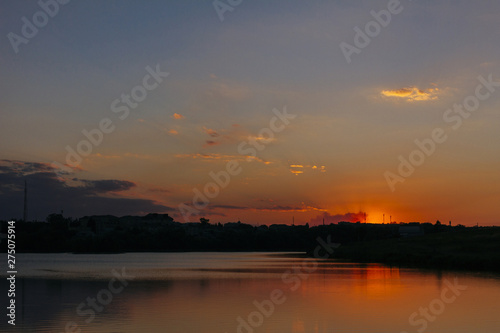 Dramatic sky over the idyllic sea at sunset