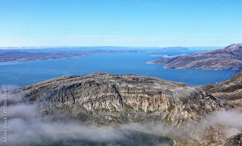 Landscape Greenland, beautiful Nuuk fjord, ocean with mountains backgroun Landscape Greenland, beautiful Nuuk fjord, ocean with mountains backgroun