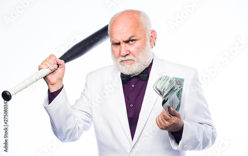 Saving money concept. Richness. criminal and robbery. debt pit. rich mature man has lots of money. mature bearded man with dollar banknotes and baseball bat. dirty business. successful businessman