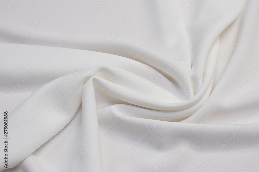 Fabric viscose (rayon). Ivory. Texture, background, pattern. Stock