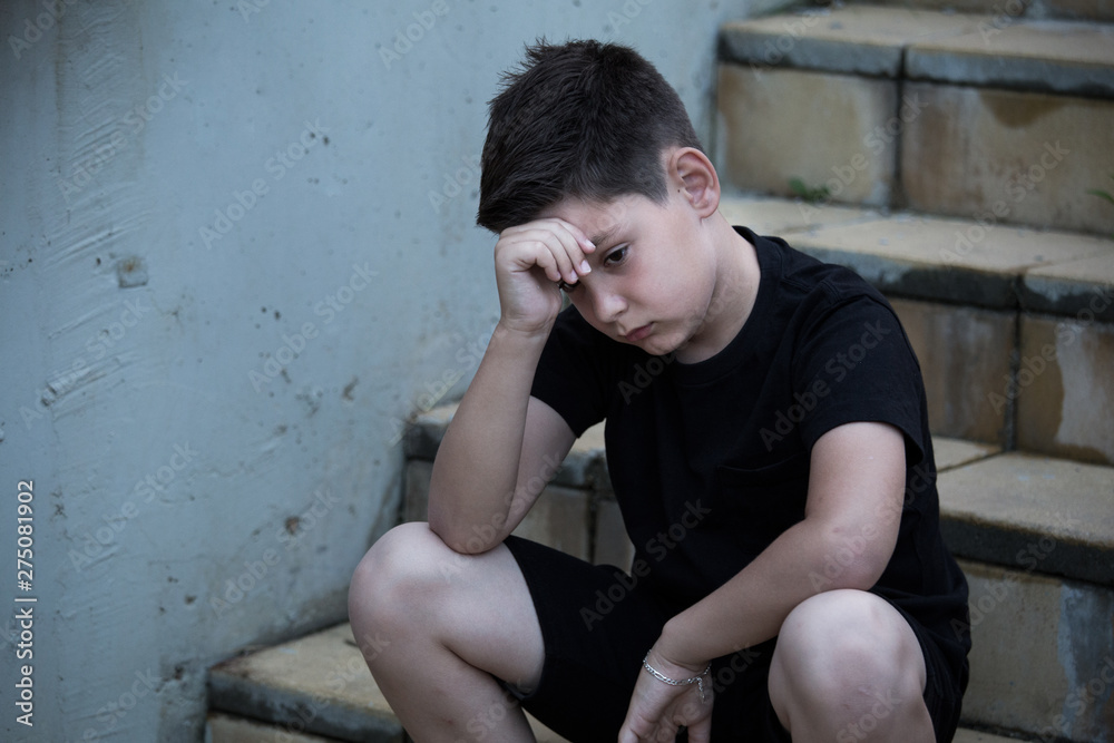 Portrait of a sad teenage boy looking thoughtful about troubles. Pensive teen. Depression, teen depression, pain, suffering. Portrait of a sad teenage boy looking thoughtful about troubles. Pensive teen. Depression, teen depression, pain, suffering.