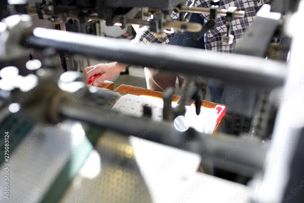 Printing machine. The printer supports the printing machine. Printing machine. The printer supports the printing machine.