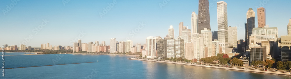 Fototapeta premium Panoramic top view Chicago skyscrapers from Michigan lake with morning autumn light