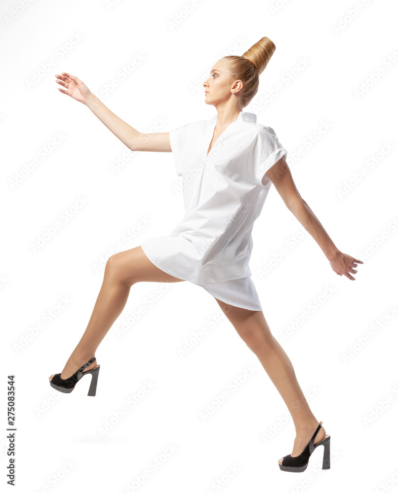 Beautiful spectacular blonde lady with an unusual high hairdo on a white background Beautiful spectacular blonde lady with an unusual high hairdo on a white background