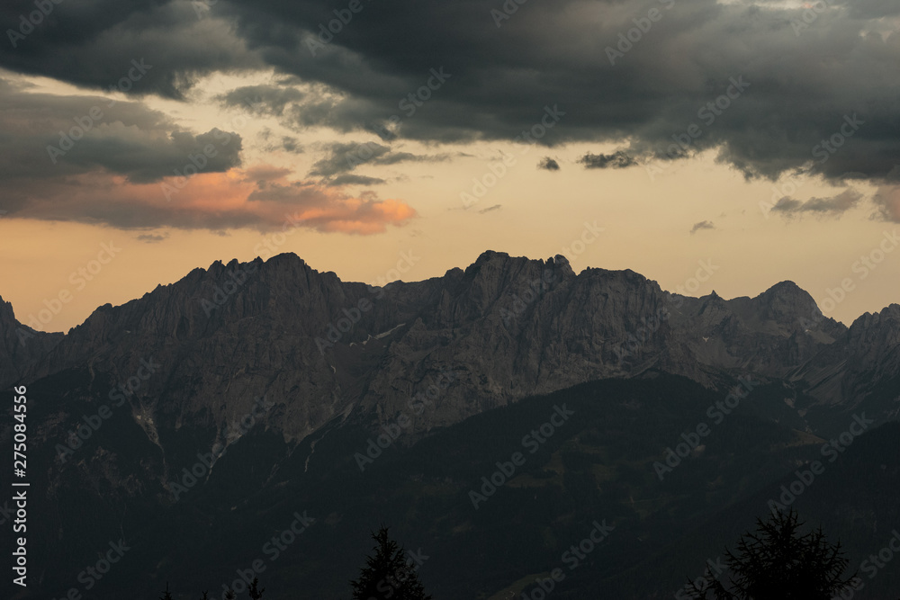 coming thunderstorm in mountains in Alps, gray sky