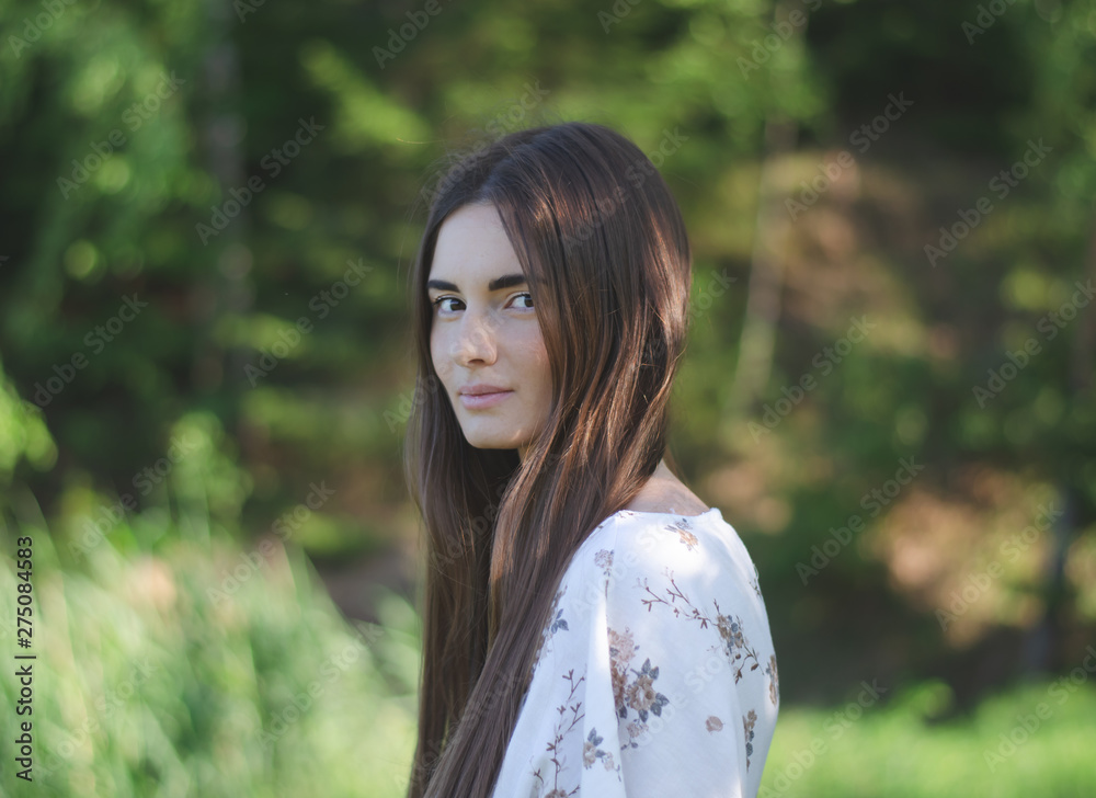 A beautiful girl with dark long hair. Summertime A beautiful girl with dark long hair. Summertime