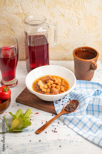 Kufte bozbash meatball soup with yellow beans with composto.  photo