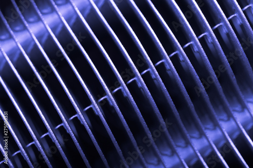 Metal surface of the radiator for a tecnical background. Toned