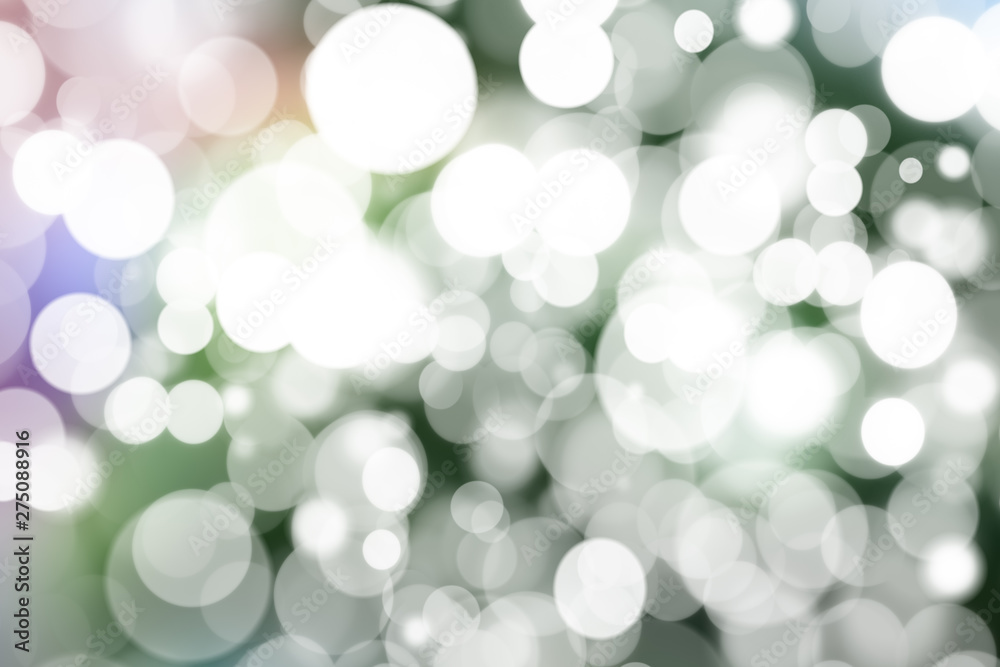 Obraz premium Abstract bokeh festive background with defocused lights
