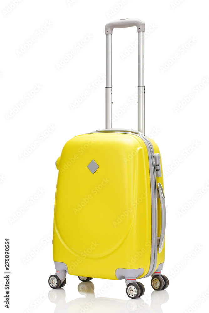 yellow plastic wheeled suitcase with handle isolated on white yellow plastic wheeled suitcase with handle isolated on white