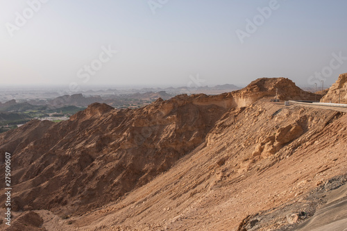 Curvy road through the Jebel Hafeet road, Al Ain, United Arab Emirates photo