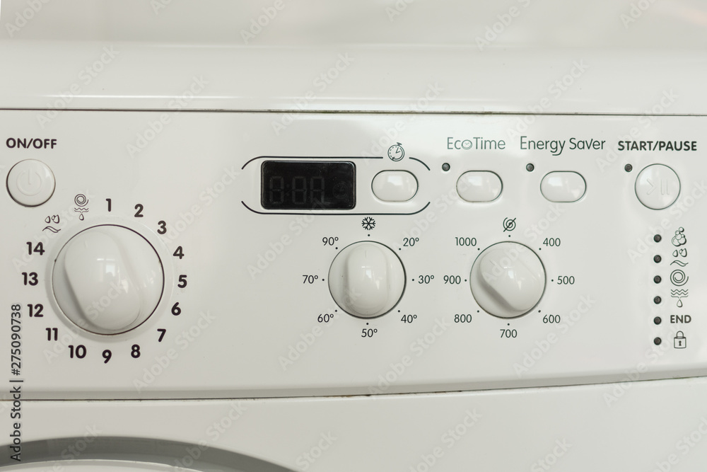 Washing machine control panel close-up. Washing machine panel for choosing programs. Washing machine control panel close-up. Washing machine panel for choosing programs.