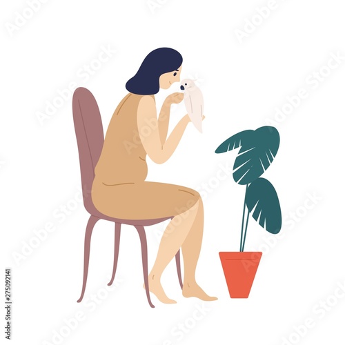 Lovely girl holding parrot