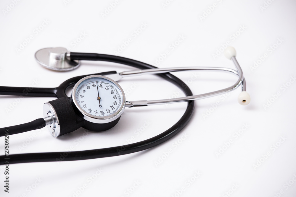 Medical Blood Pressure device. Medical and hospital concept. Stethoscope on white background. phonendoscope for doctor. Stethoscope bright background. Close up equipment medical Stethoscope. Medical Blood Pressure device. Medical and hospital concept. Stethoscope on white background. phonendoscope for doctor. Stethoscope bright background. Close up equipment medical Stethoscope.