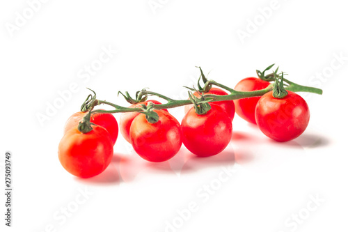 Lots of Cherry tomatoes, isolated on white background