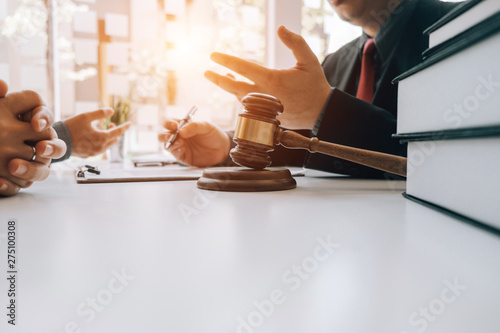 smart lawyer review and give advice to clients in the office before considering the judgment, lawyer concept