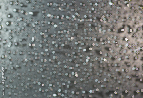Many light gray bokeh backgrounds spread throughout the area.