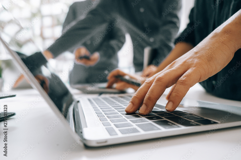 Business people analyzing investment graph meeting brainstorming and discussing plan in meeting room, investment concept Business people analyzing investment graph meeting brainstorming and discussing plan in meeting room, investment concept