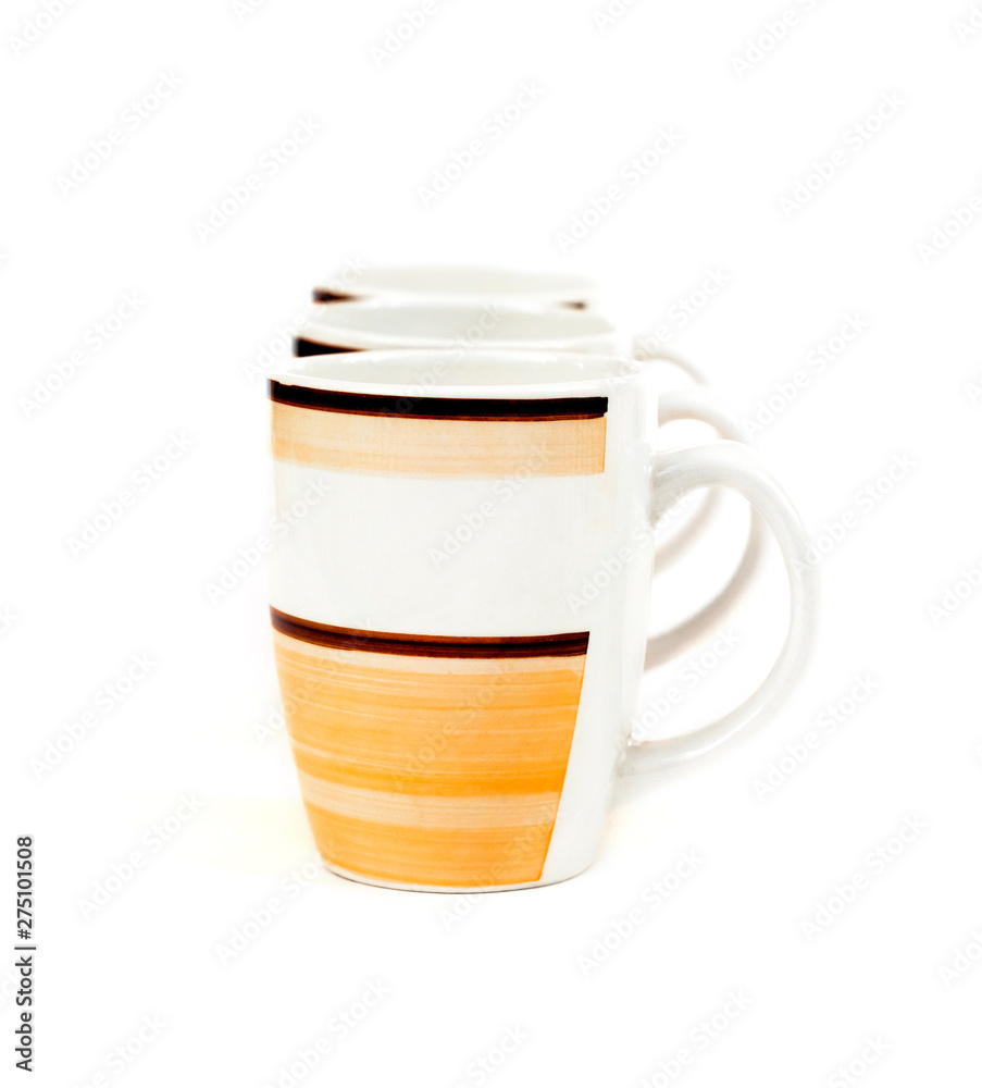 Row of three mugs isolated on white background Row of three mugs isolated on white background