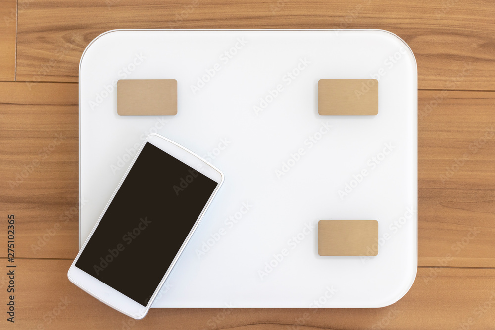床に置いた体重計とスマートフォン 床に置いた体重計とスマートフォン