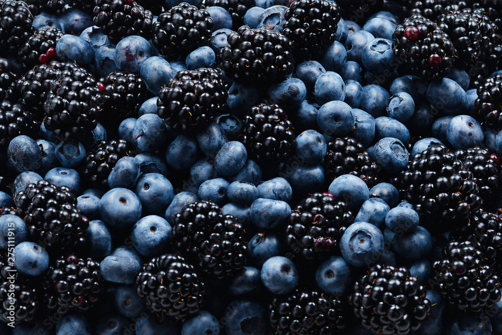 Blackberry and blueberry background. Top view. Blackberry and blueberry background. Top view.