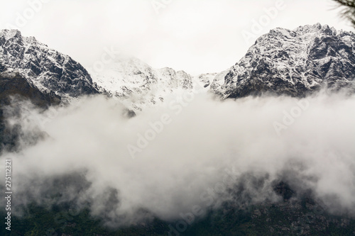fog on the mountains in the winter at south island newzealand 