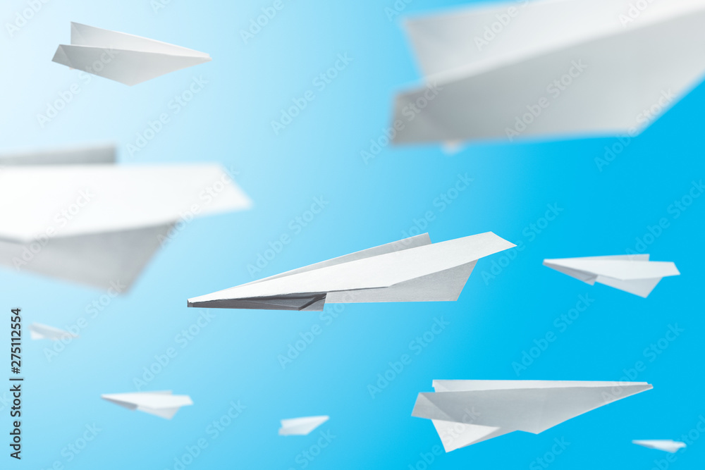 Overloaded airspace. Several paper planes. Blue sky on background. Overloaded airspace. Several paper planes. Blue sky on background.