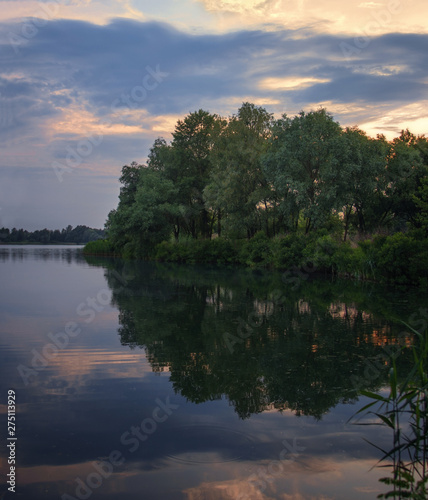 On the lake in the evening before sunset