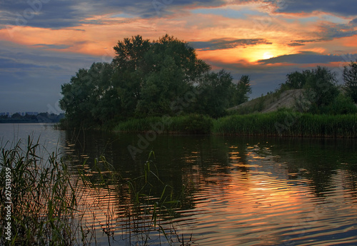 On the lake in the evening before sunset